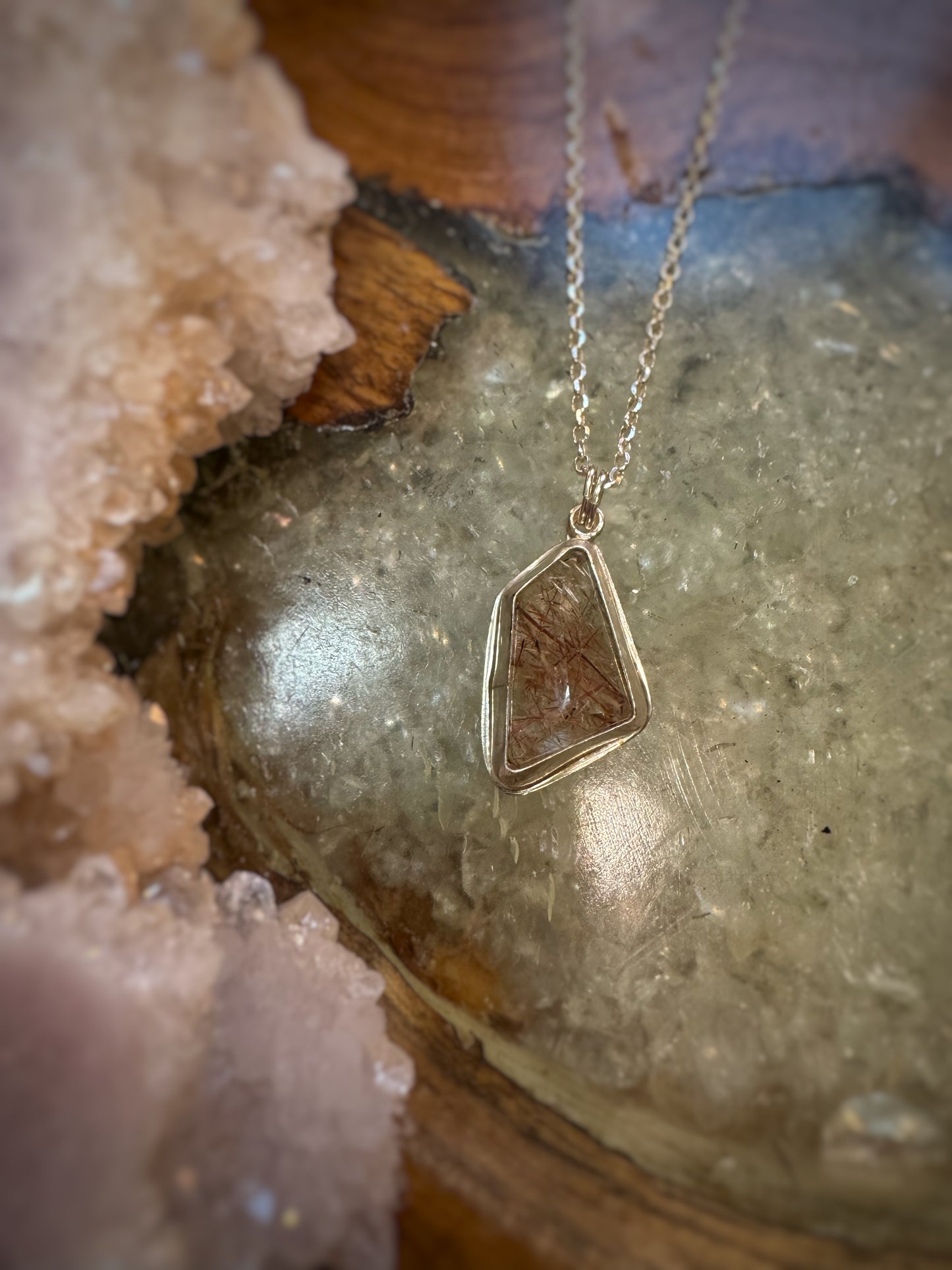 Golden rutile quartz pendant on sterling silver chain