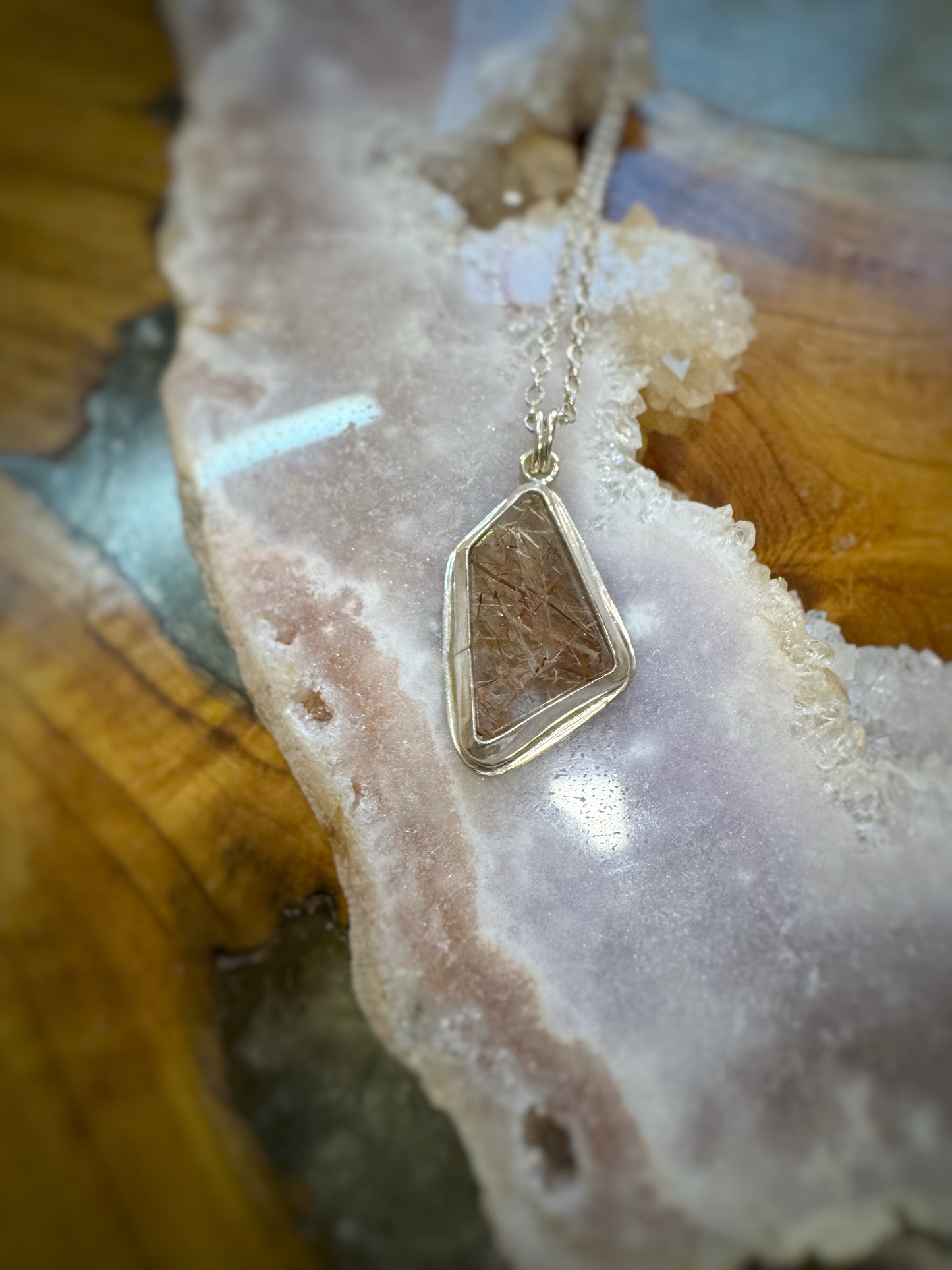 Golden rutile quartz pendant on sterling silver chain