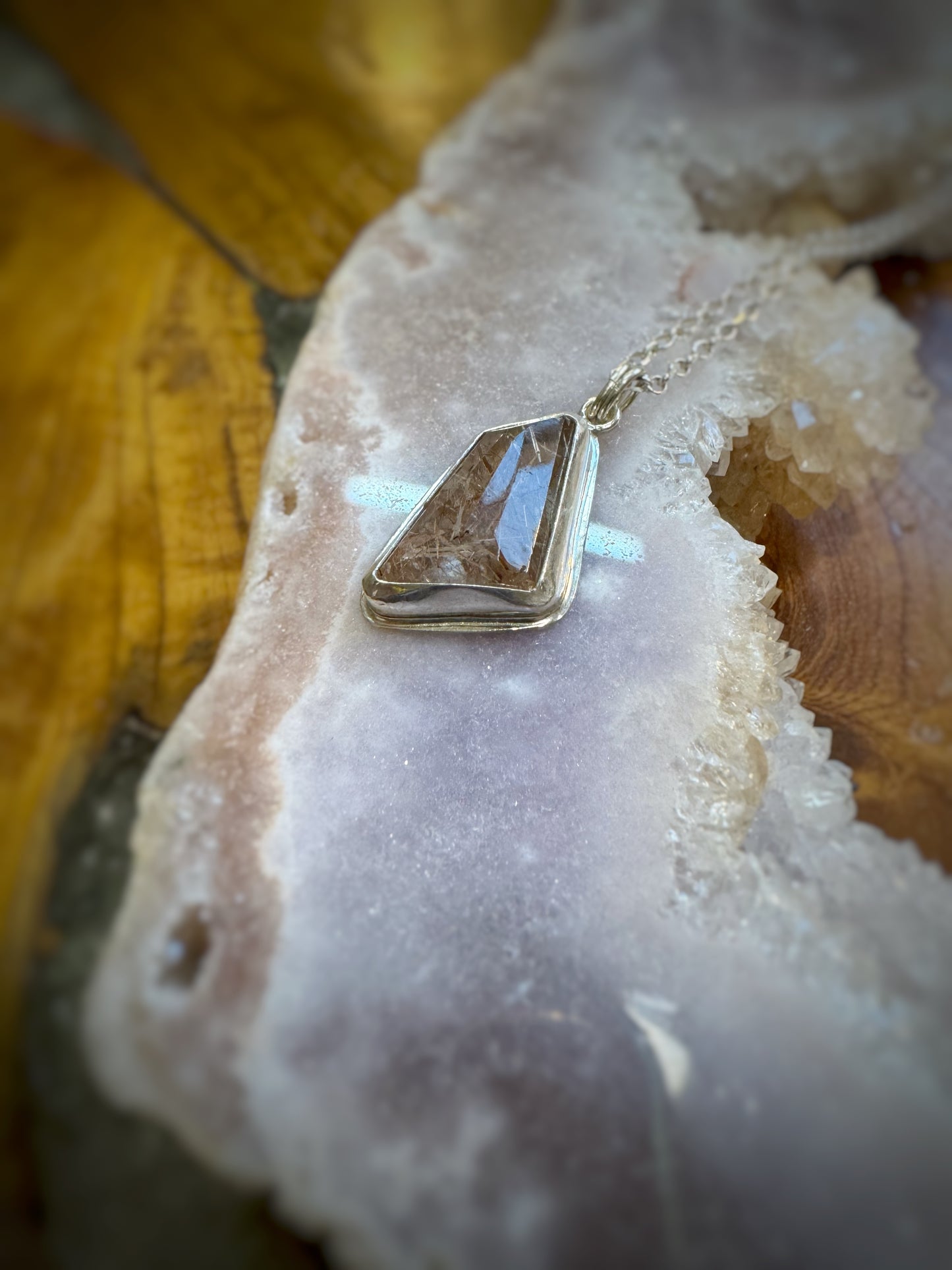 Golden rutile quartz pendant on sterling silver chain